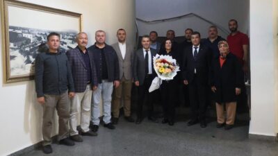 AK Parti Kuyucak İlçe Başkanı Mehmet Emin Sayar, ilçe yönetim
