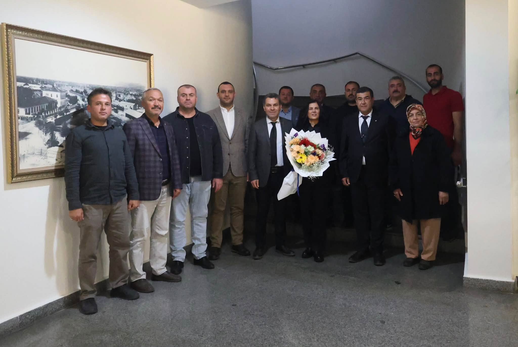 AK Parti Kuyucak İlçe Başkanı Mehmet Emin Sayar, ilçe yönetim